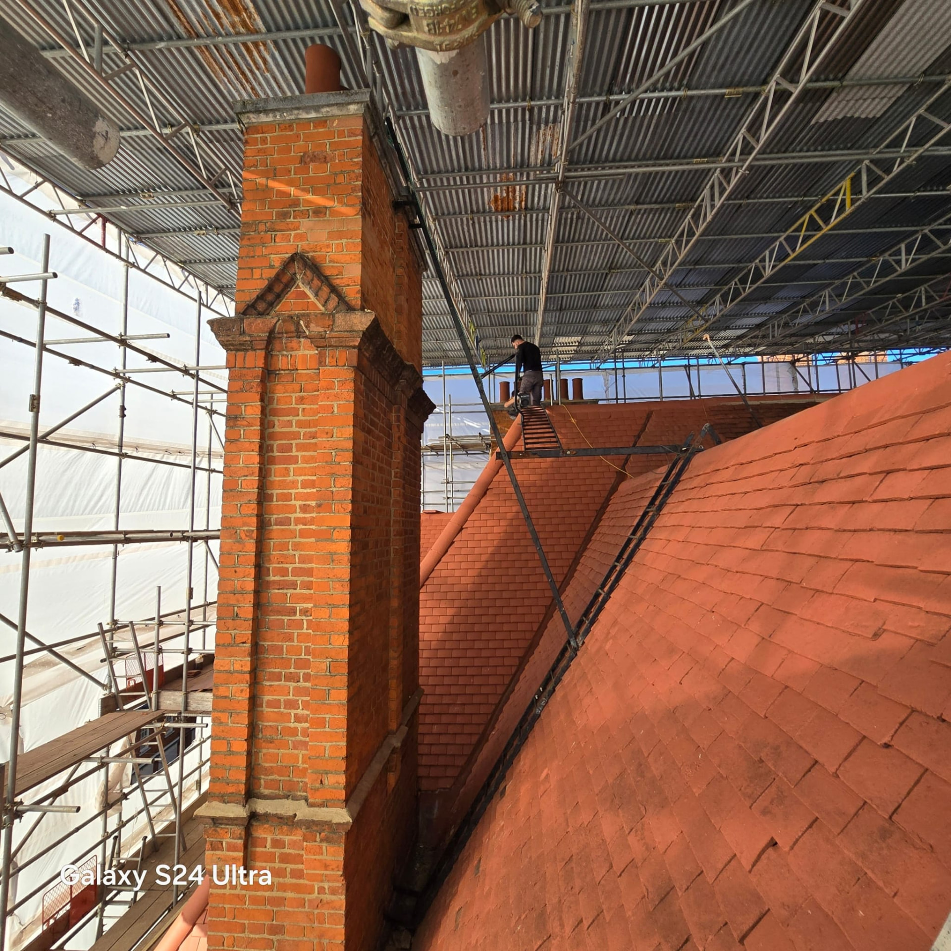 Restored chimney stack and new clay tiling seen from the scaffold at the Jamaican High Commission